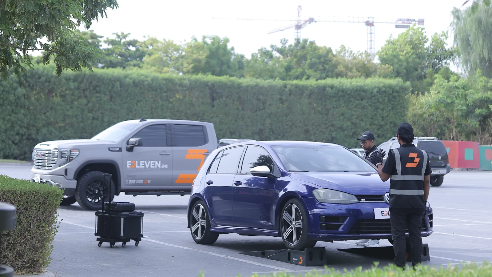 E3LEVEN technicians conducting an onsite vehicle inspection